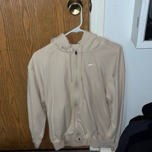 This is a zip up hoodie from Nike has never been worn! Has a oversized fit